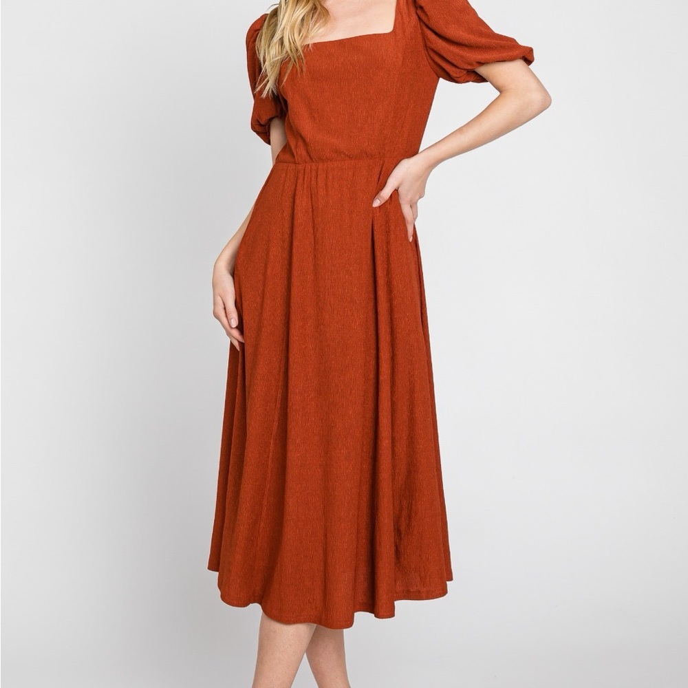 Elegant Rust MIdi Dress, Lined. Has pockets. A-line